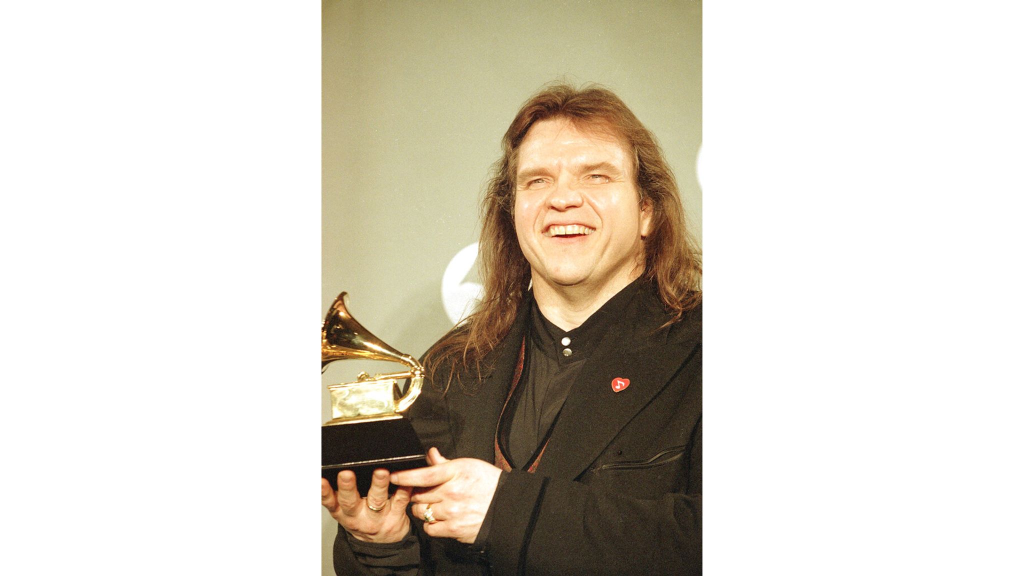 Meat Loaf in 1994 with his Grammy for best solo rock performance. Pic: AP