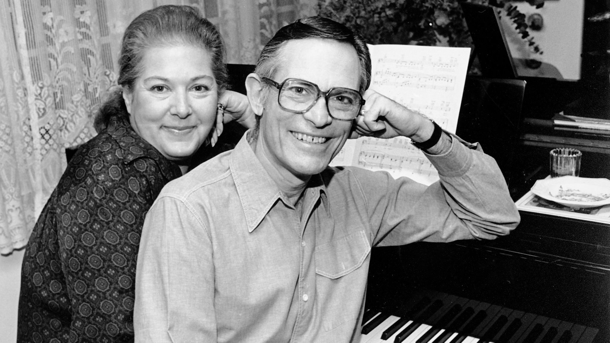 Marilyn and Alan Bergman pose at their piano in their Beverly Hills home on March 17, 1980. Pic: AP