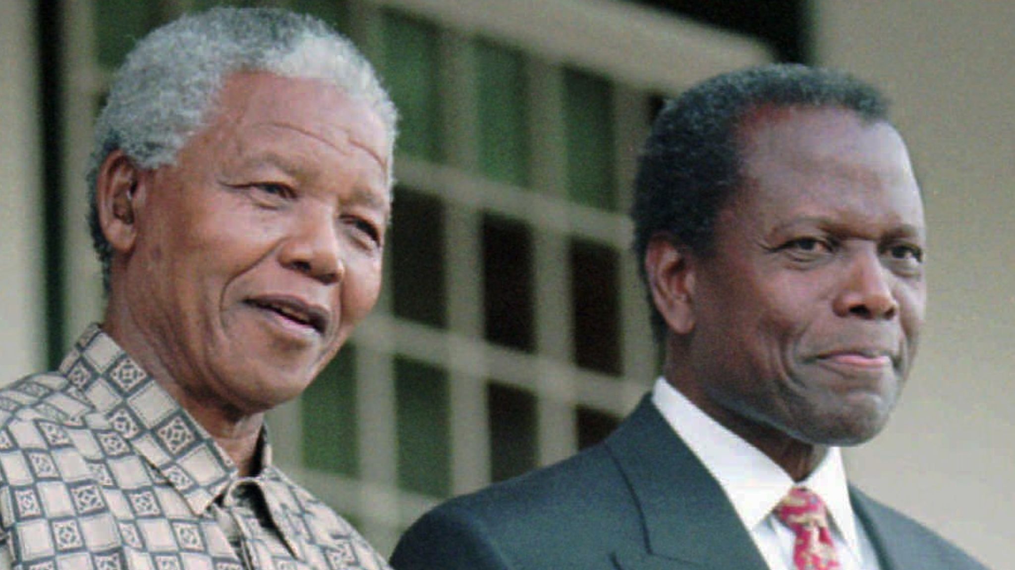 Pic: AP Sidney Poitier with Nelson Mandela in 1997. 