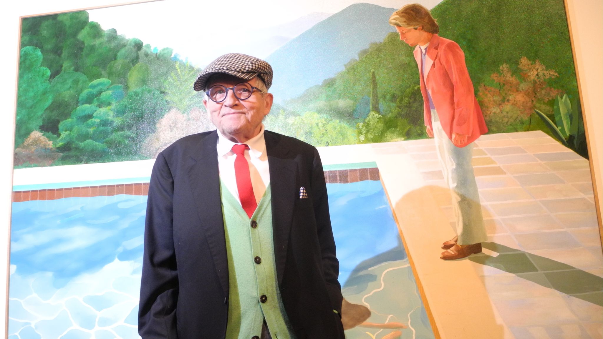 David Hockney standing in front of his "Portrait of an Artist (Pool with Two Figures)"&#39;painting at the Metropolitan Museum of Art in New York, USA, 20 November 2017. The Museum is dedicating a large retrospective to the work of Hockney, which spans almost 60 years. Photo by: Johannes Schmitt-Tegge/picture-alliance/dpa/AP Images