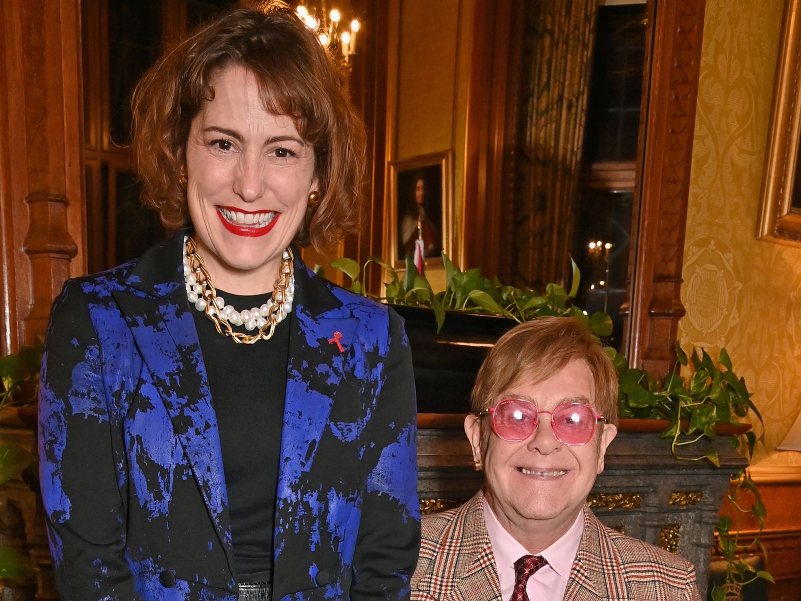 LONDON, ENGLAND - NOVEMBER 29: Victoria Atkins, Secretary of State for Health, and Sir Elton John attend a reception honouring Sir Elton John hosted by the All Party Parliamentary Group on HIV/AIDS at Speakers House in recognition of his enduring commitment to ending the AIDS epidemic, both personally and through the work of the Elton John AIDS Foundation, on November 29, 2023 in London, England. ..Photo by Dave Benett 