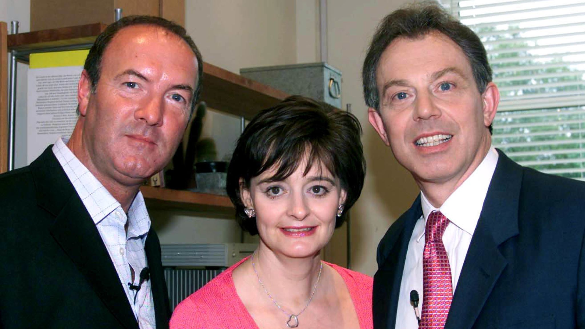 Prime Minster Tony Blair, accompanied by his wife Cherie on the set of the Liverpool-based soap Brookside, with cast member Dean Sullivan (left) who plays Jimmy Corkhill.