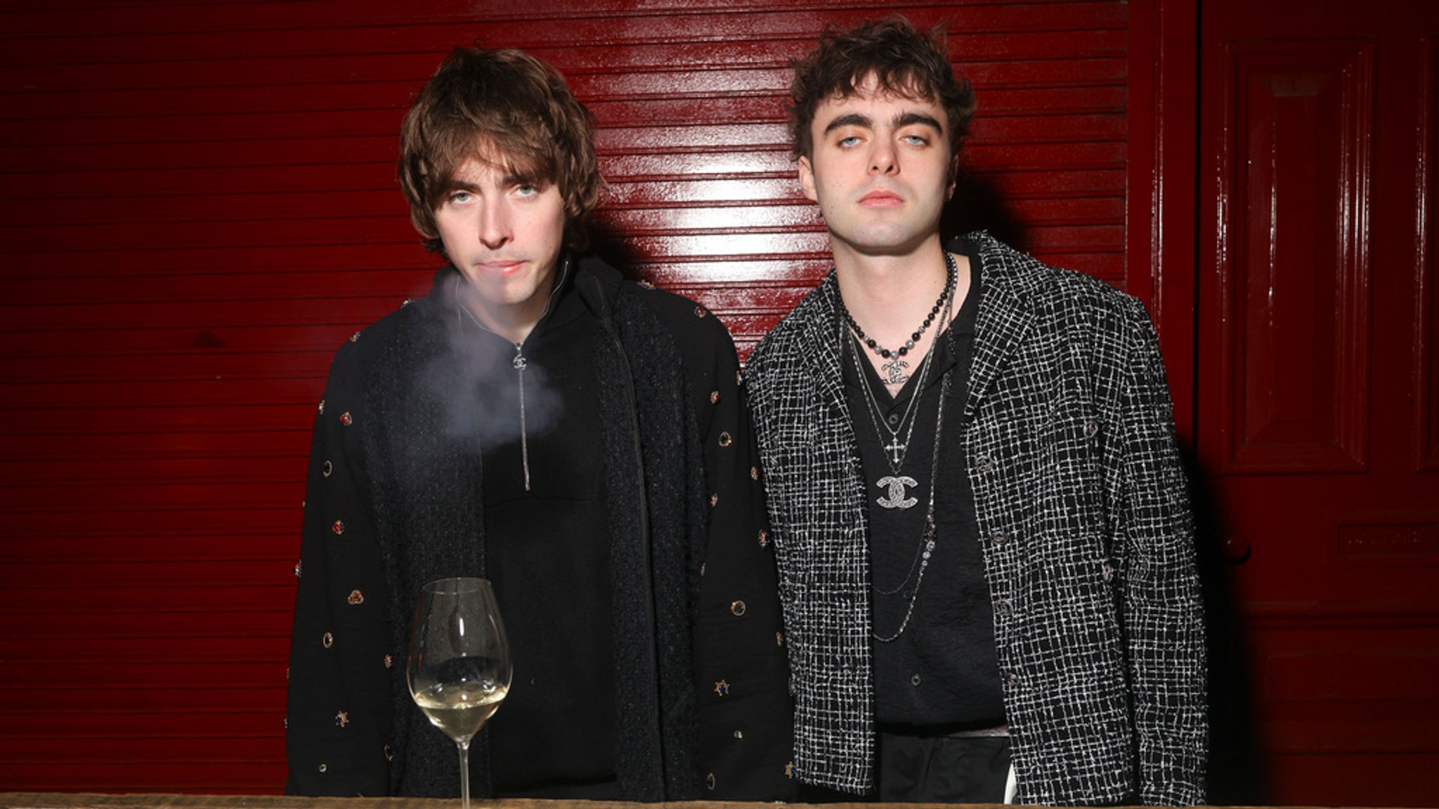 Gene Gallagher, left, and Lennon Gallagher attend the Chanel Metiers d&#39;Art show in Manchester Thursday, Dec. 7, 2023. (Photo by Vianney Le Caer/Invision/AP)