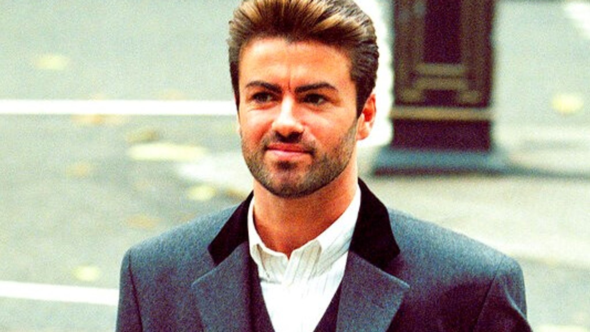 Pop star George Michael arrives to give evidence at the Royal Courts of Justice in London, Thursday, Oct. 28, 1993. Michael is petitioning the court to release hin from his contract with Sony Music Entertainment (UK) Ltd. (AP Photo/Alistair Grant)