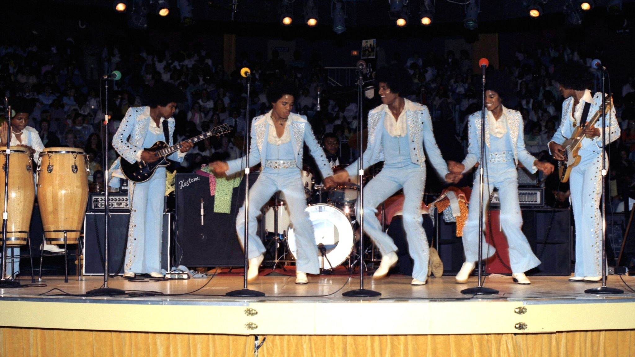 EXCLUSIVE TO EVERETT - NEVER PREVIOUSLY PUBLISHED: The Jackson Five: from back left: Randy Jackson, Tito Jackson, Marlon Jackson, Jackie Jackson, Michael Jackson, Jermaine Jackson, 1975, Millrun Playhouse Theater in the Round, Nile, Illinois. 1975 Pic: Everett/Shutterstock