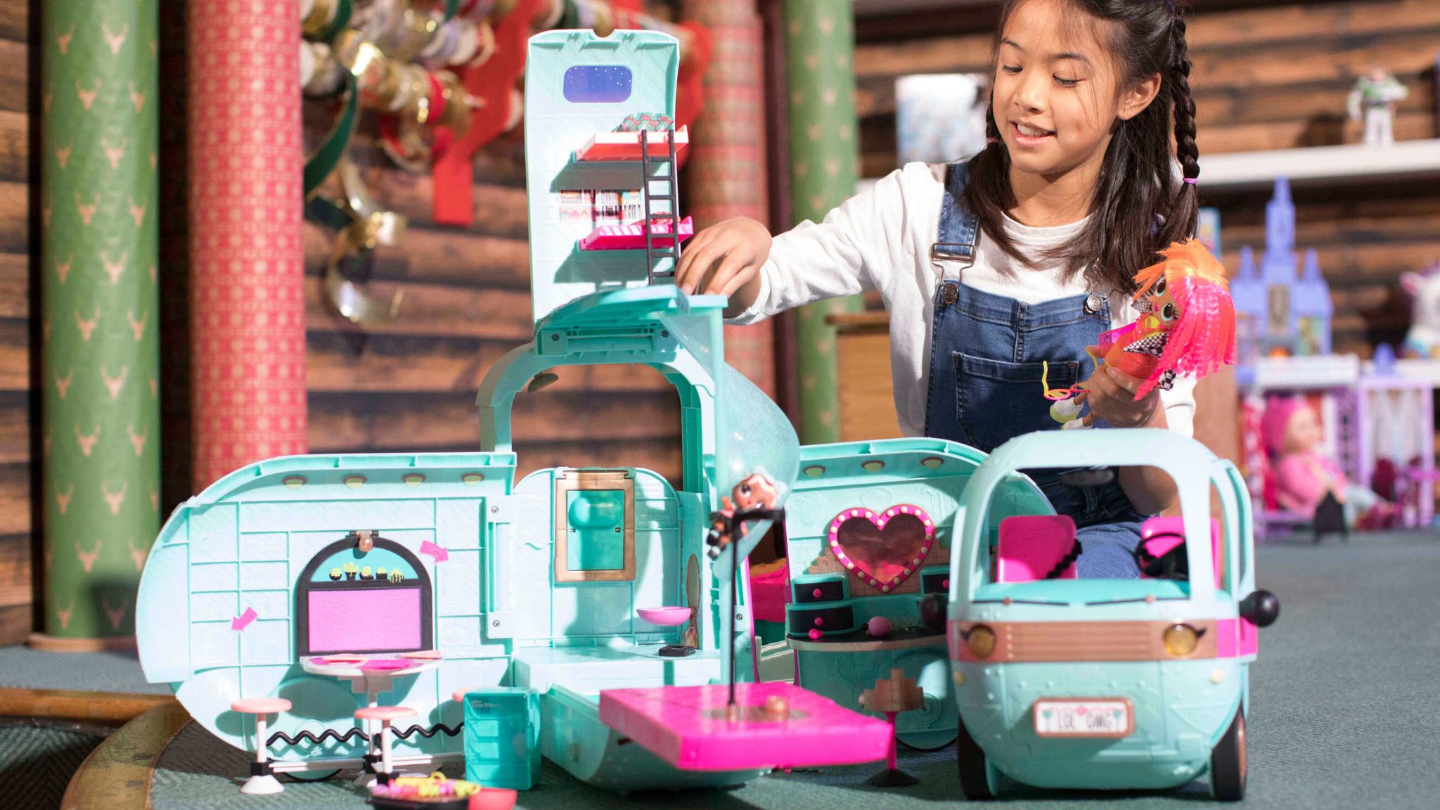 Fiona Mah aged 10 plays with the new L.O.L Surprise 2-in-1 Glamper