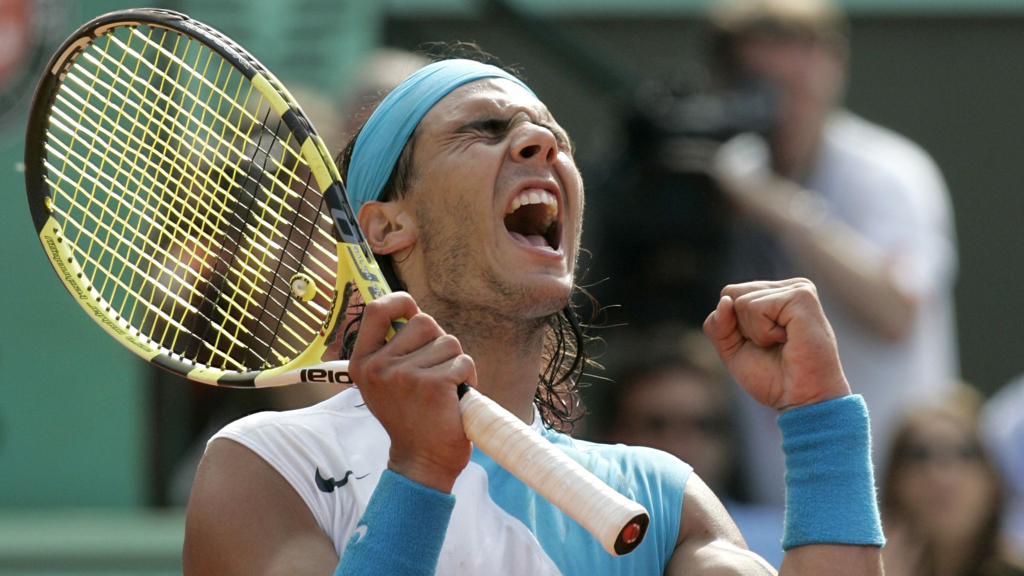 Spain's Rafael Nadal reacts as he plays Switzerland's Roger Federer during the men's final match of the French Open tennis tournament at the Roland Garros stadium in Paris, Sunday, June 10, 2007. (AP Photo/Lionel Cironneau)