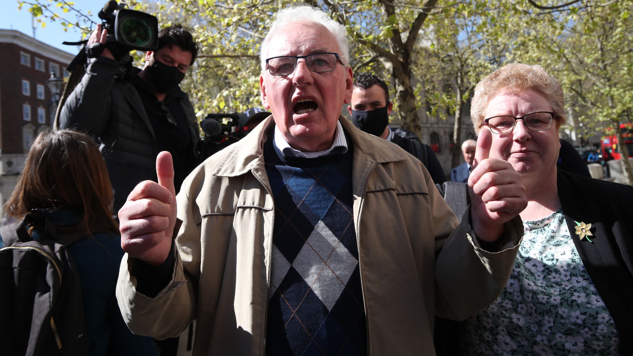 Former post office worker Noel Thomas, who was convicted of false accounting in 2006, celebrates with his daughter Sian outside the Royal Courts of Justice, London, after having his conviction overturned by the Court of Appeal. Thirty-nine former subpostmasters who were convicted of theft, fraud and false accounting because of the Post Office&#39;s defective Horizon accounting system have had their names cleared by the Court of Appeal. Picture date: Friday April 23, 2021.