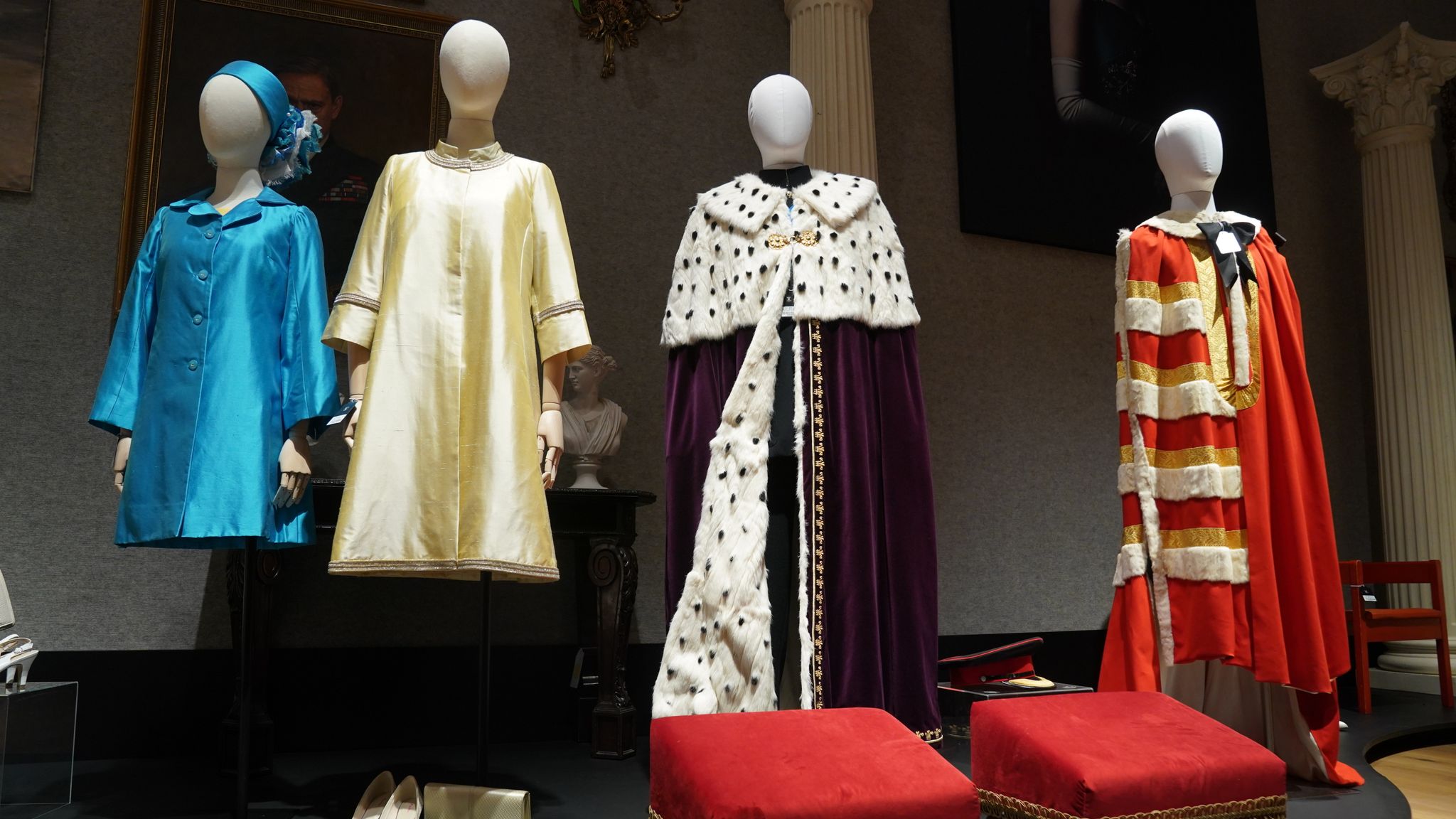 Replica outfits worn by The Royal Family which are part of the collection of more than 450 costumes, sets and props from the Netflix series The Crown, on show at Bonhams in central London, ahead of being auctioned next month. Picture date: Tuesday January 9, 2024. 