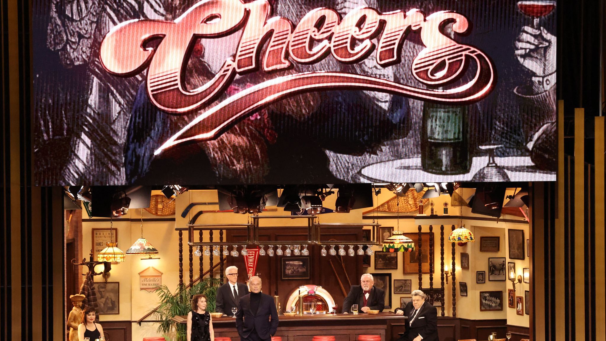 Rhea Perlman, Kelsey Grammer, Ted Danson, John Ratzenberger and George Wendt perform in a sketch from the show "Cheers" at the 75th Primetime Emmy Awards in Los Angeles, California, U.S. January 15, 2024. REUTERS/Mario Anzuoni 