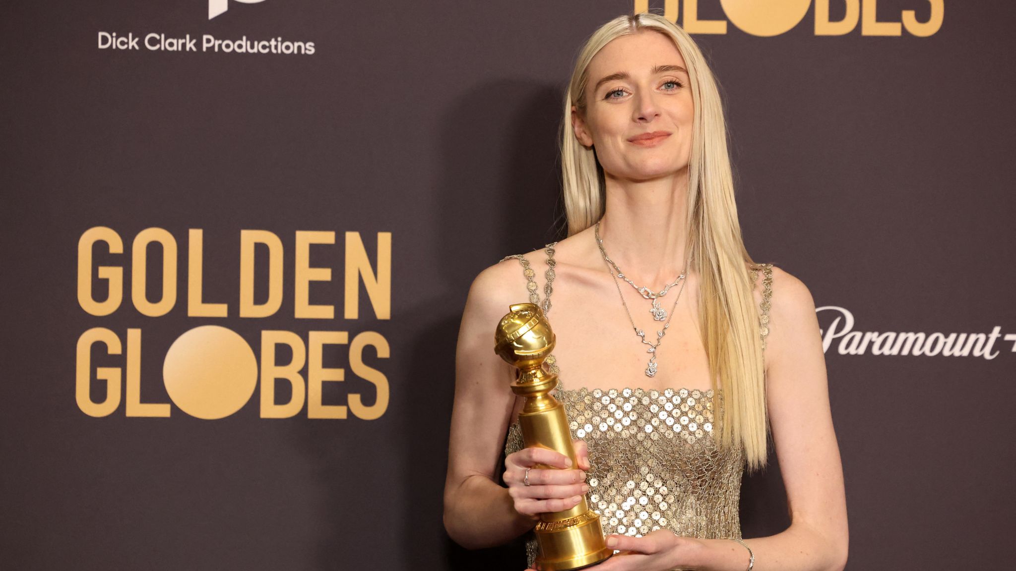 Elizabeth Debicki poses with the award for Best Performance by a Female Actor in a Supporting Role on Television for "The Crown" at the 81st Annual Golden Globe Awards in Beverly Hills, California, U.S., January 7, 2024. REUTERS/Mario Anzuoni 