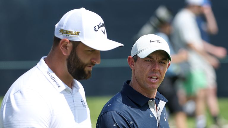 Jon Rahm of Spain and Rory McIlroy of Northern Ireland walk the second hole during a practice round prior to the 2022 U.S. Open at The Country Club on June 13, 2022 in Brookline, Massachusetts. (Photo by Warren Little/Getty Images)