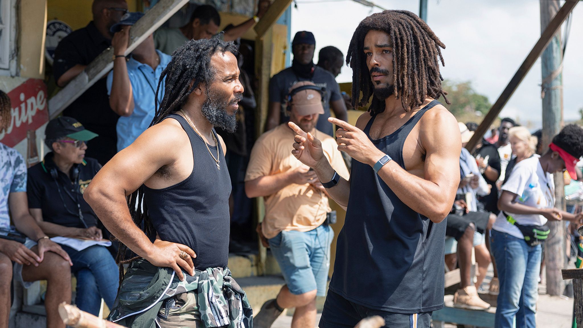 This image released by Paramount Pictures shows producer Ziggy Marley, left, and Kingsley Ben-Adir on the set of "Bob Marley: One Love." (Chiabella James/Paramount Pictures via AP)