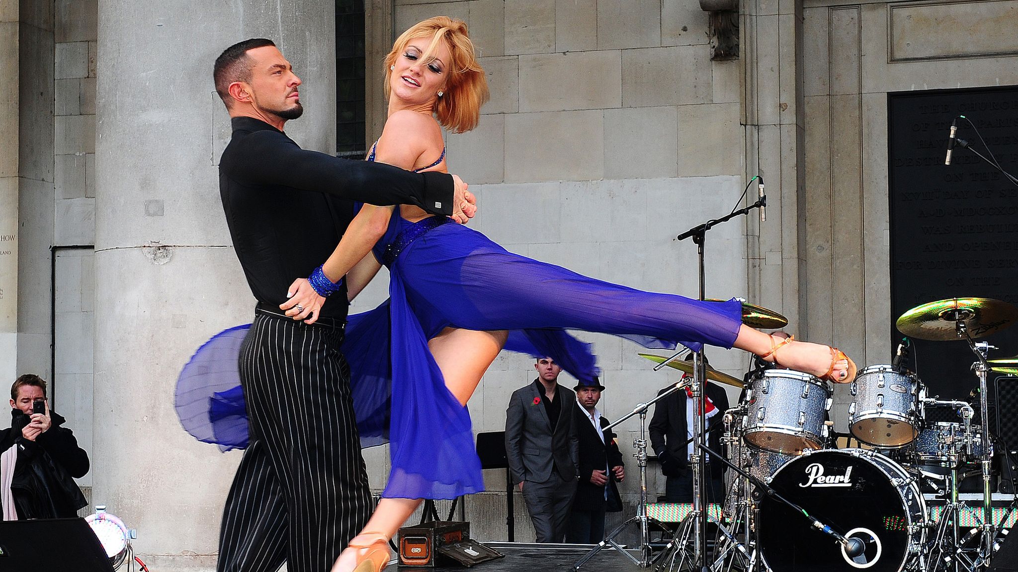 Aliona Vilani and Robin Windsor perform while selling Poppies in Covent Garden. Pic: PA