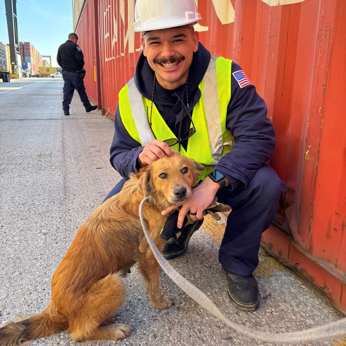 Connie with one of the coast guards who rescued her. Pic: USCG