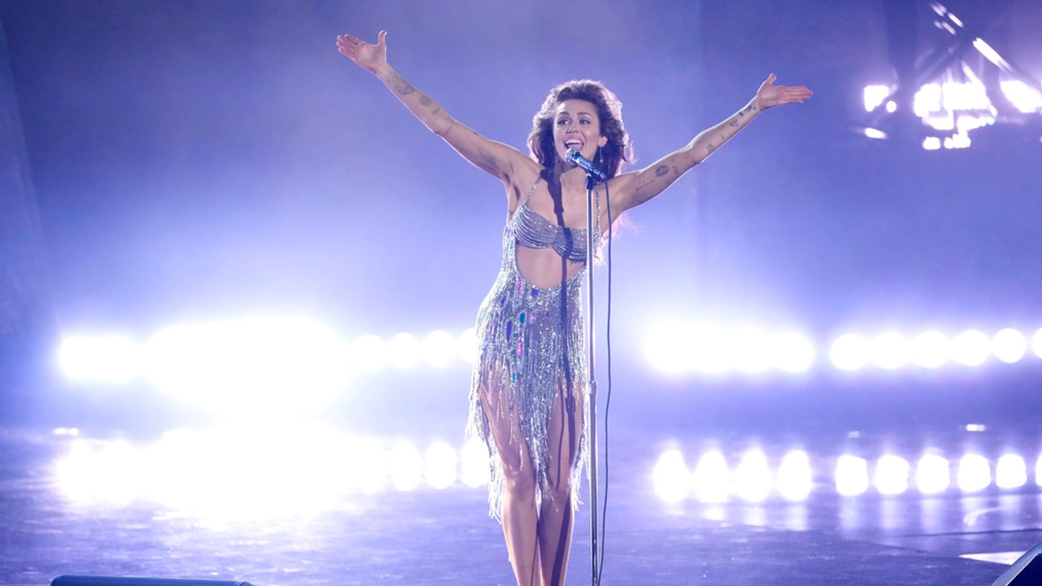 Miley Cyrus performs "Flowers" during the 66th annual Grammy Awards on Sunday, Feb. 4, 2024, in Los Angeles. (AP Photo/Chris Pizzello)