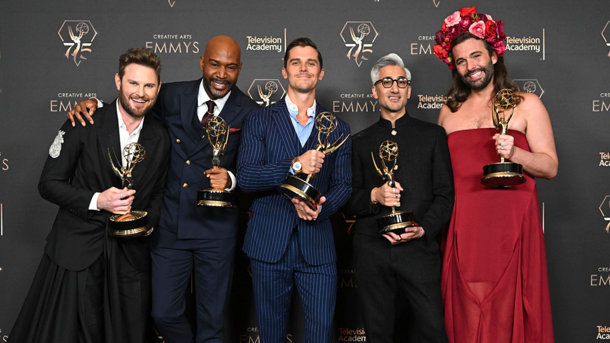 Bobby Berk, from left, Karamo Brown, Antoni Porowski, Tan France, and Jonathan Van Ness with their Emmy for outstanding structured reality program for "Queer Eye" in the press room during night two of the Television Academy&#39;s 75th Creative Arts Emmy Awards at the Peacock Theater on Sunday, Jan. 7, 2024 in Los Angeles. (Photo by Dan Steinberg/Invision for the Television Academy/AP Images)