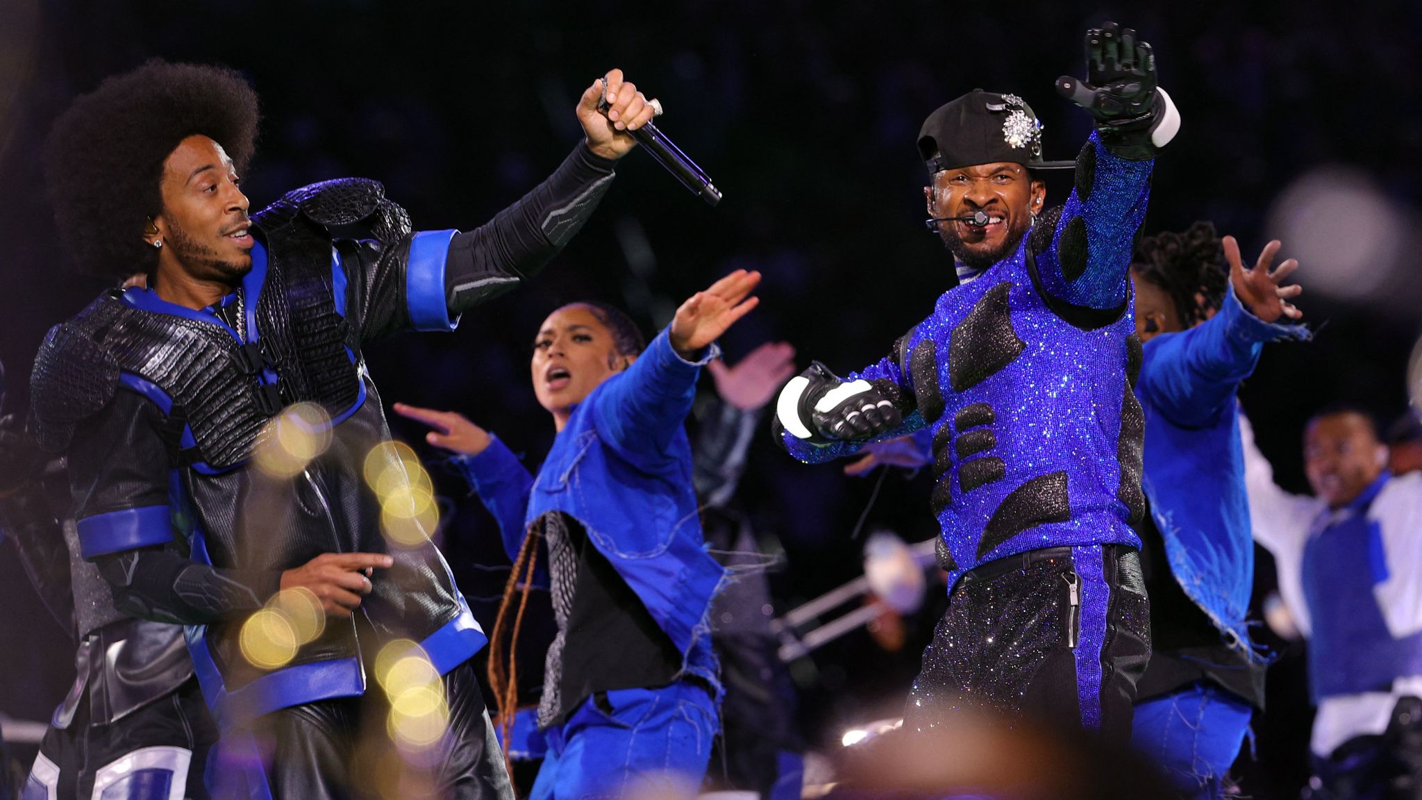 Usher performs alongside Ludacris. Pic: Reuters
