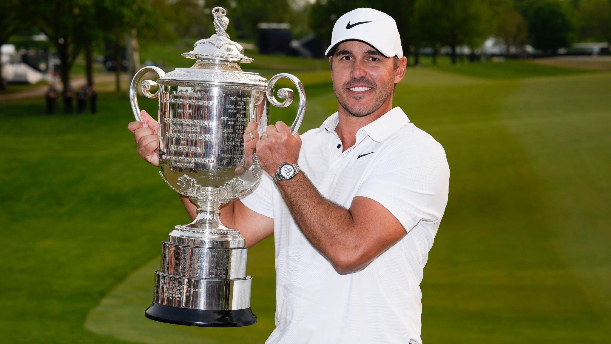 Brooks Koepka holds the Wanamaker trophy after winning the PGA Championship