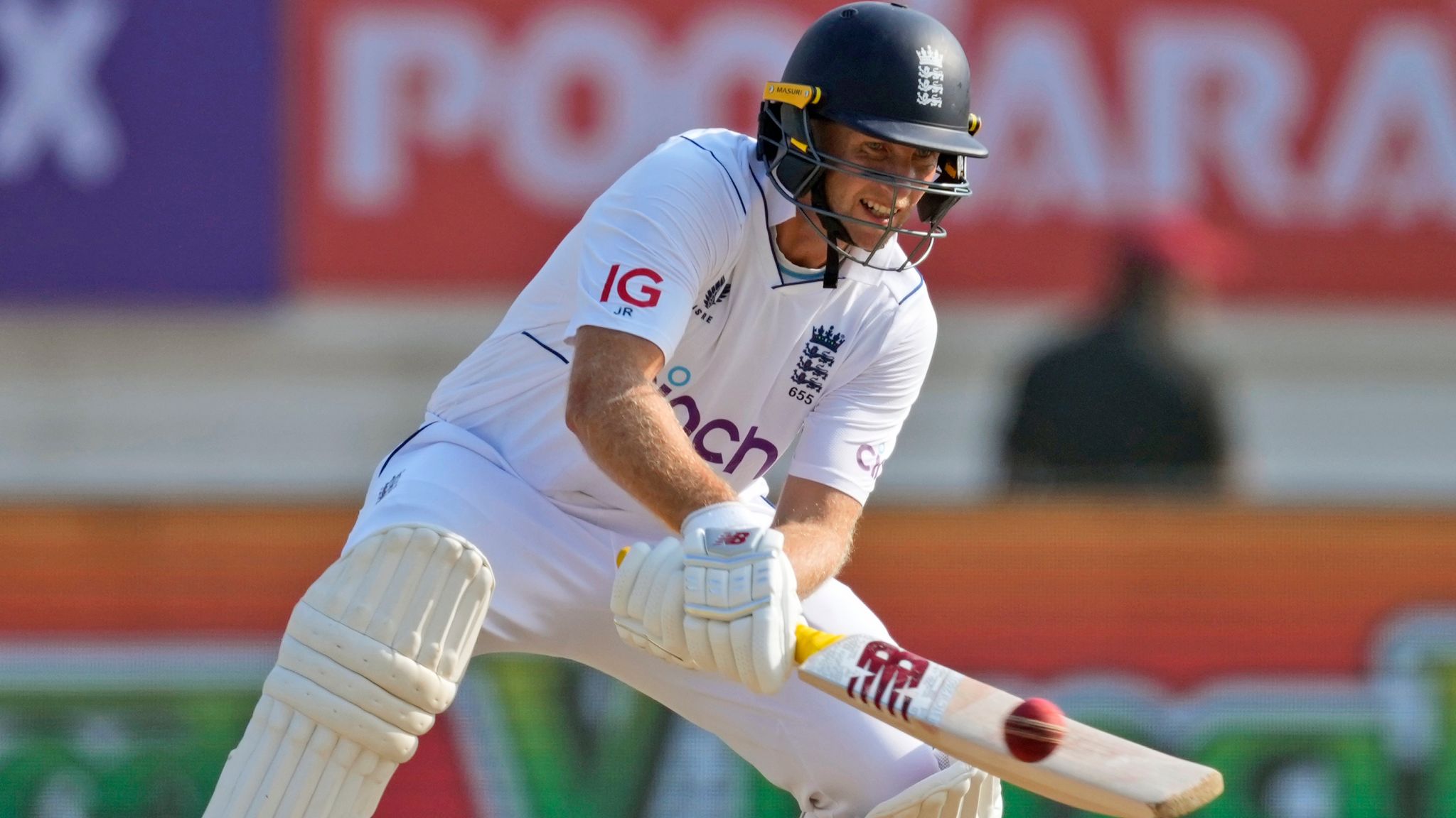 England's Joe Root playing a reverse scoop (Associated Press)