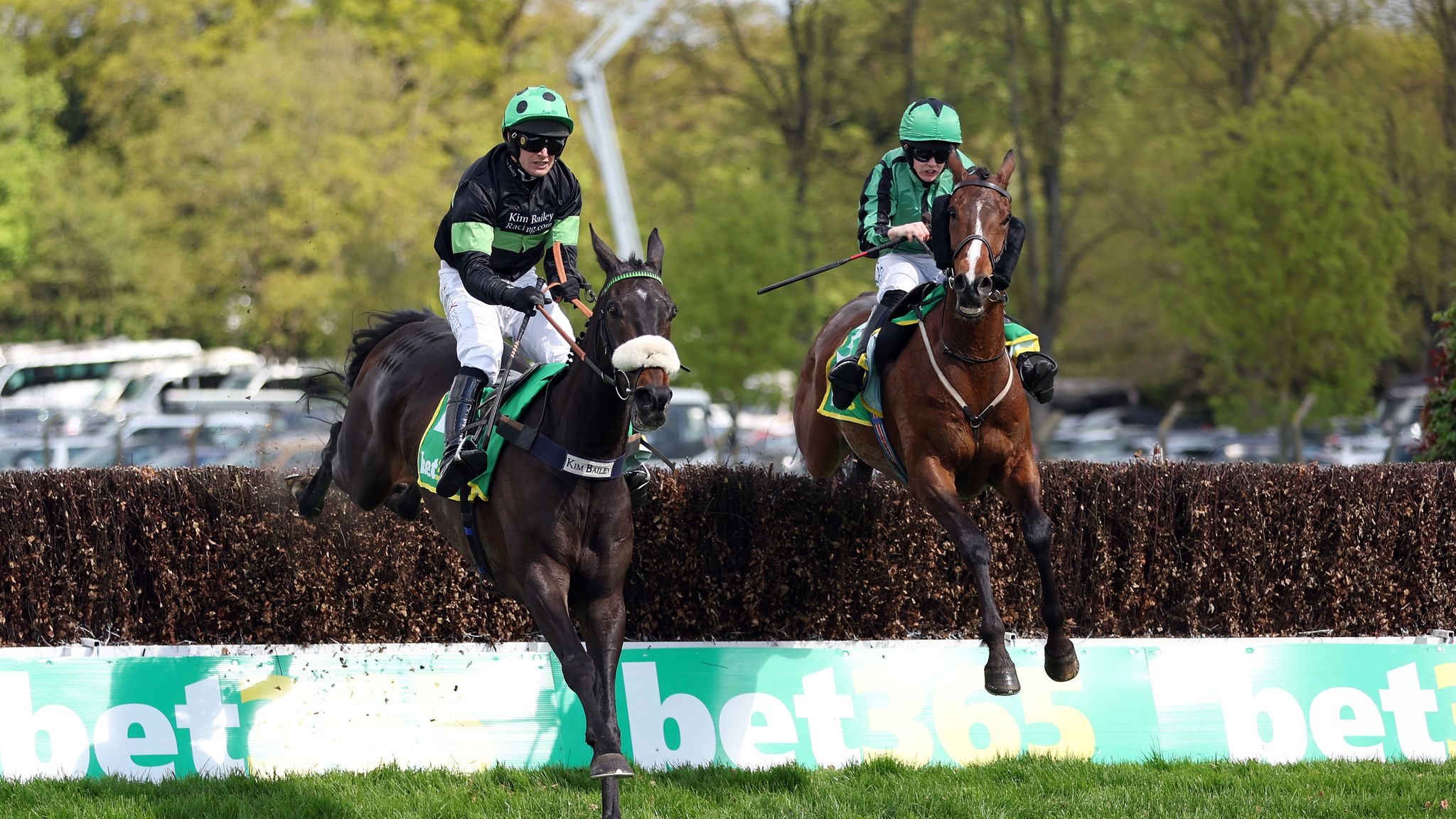 Hewick (right) and First Flow battle it out in the Oaksey Chase