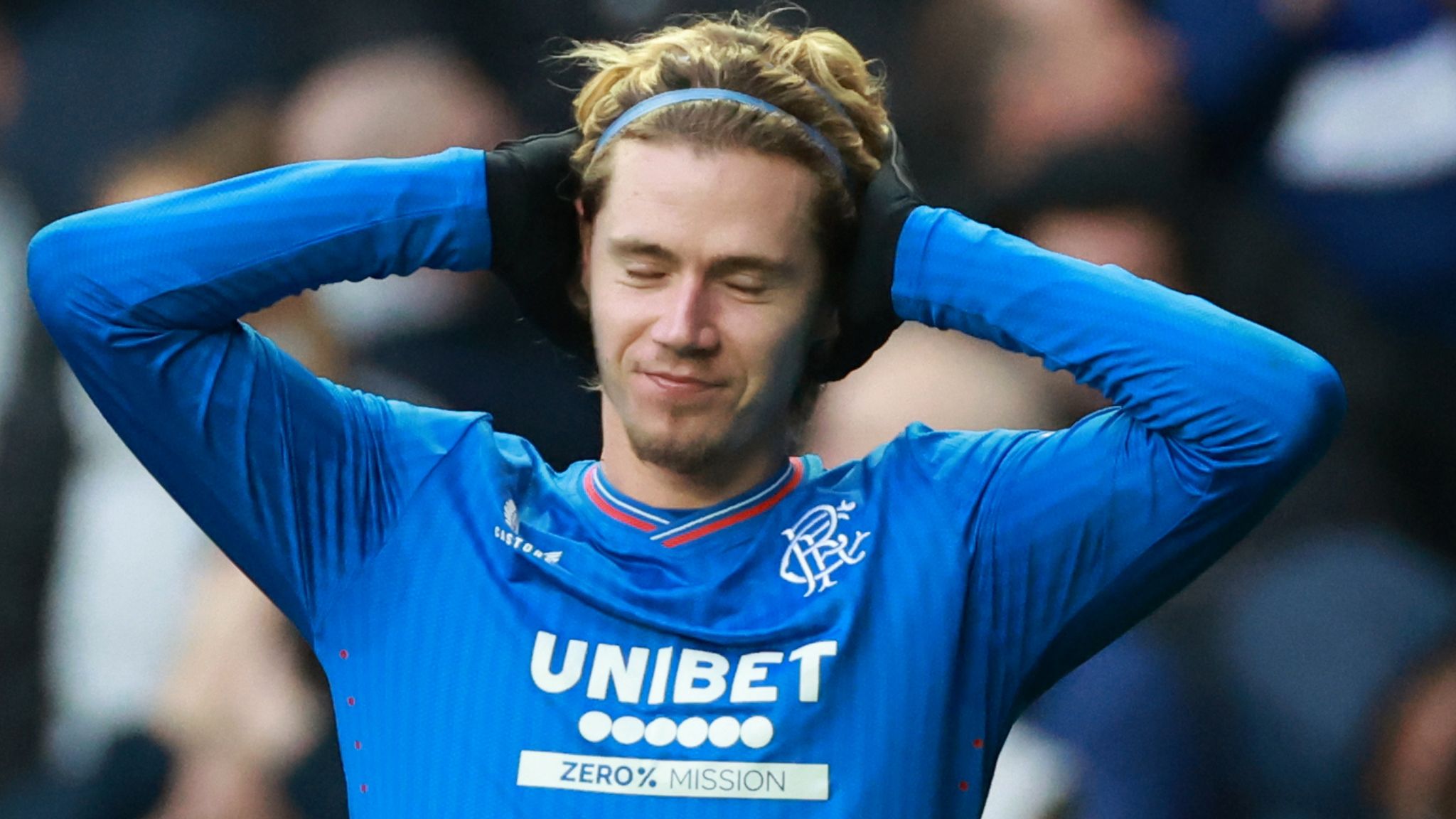 Todd Cantwell celebrates after scoring Rangers' third goal against Livingston