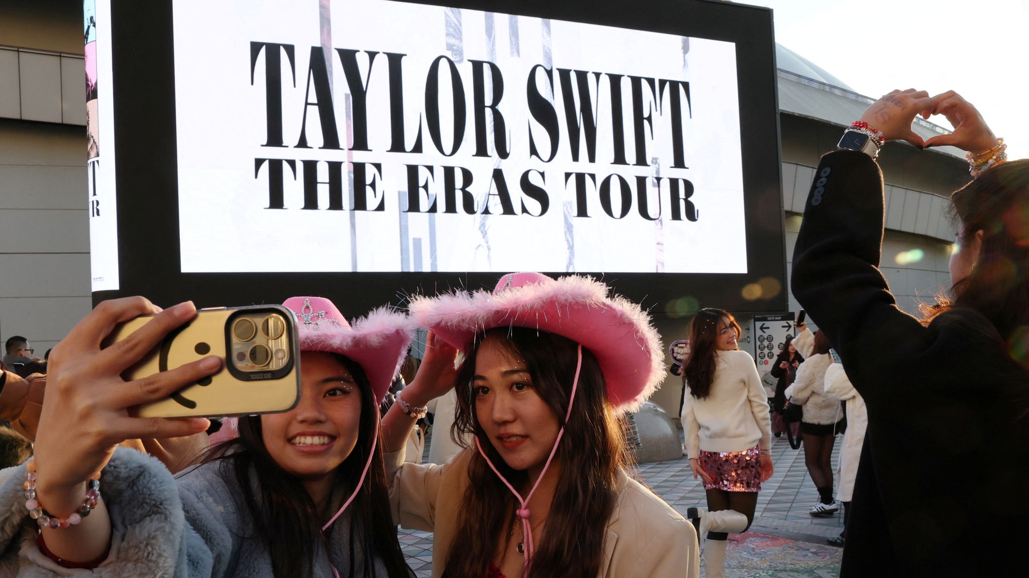Fans outside Swift&#39;s Eras Tour gig in Tokyo on 7 February. Pic: Reuters