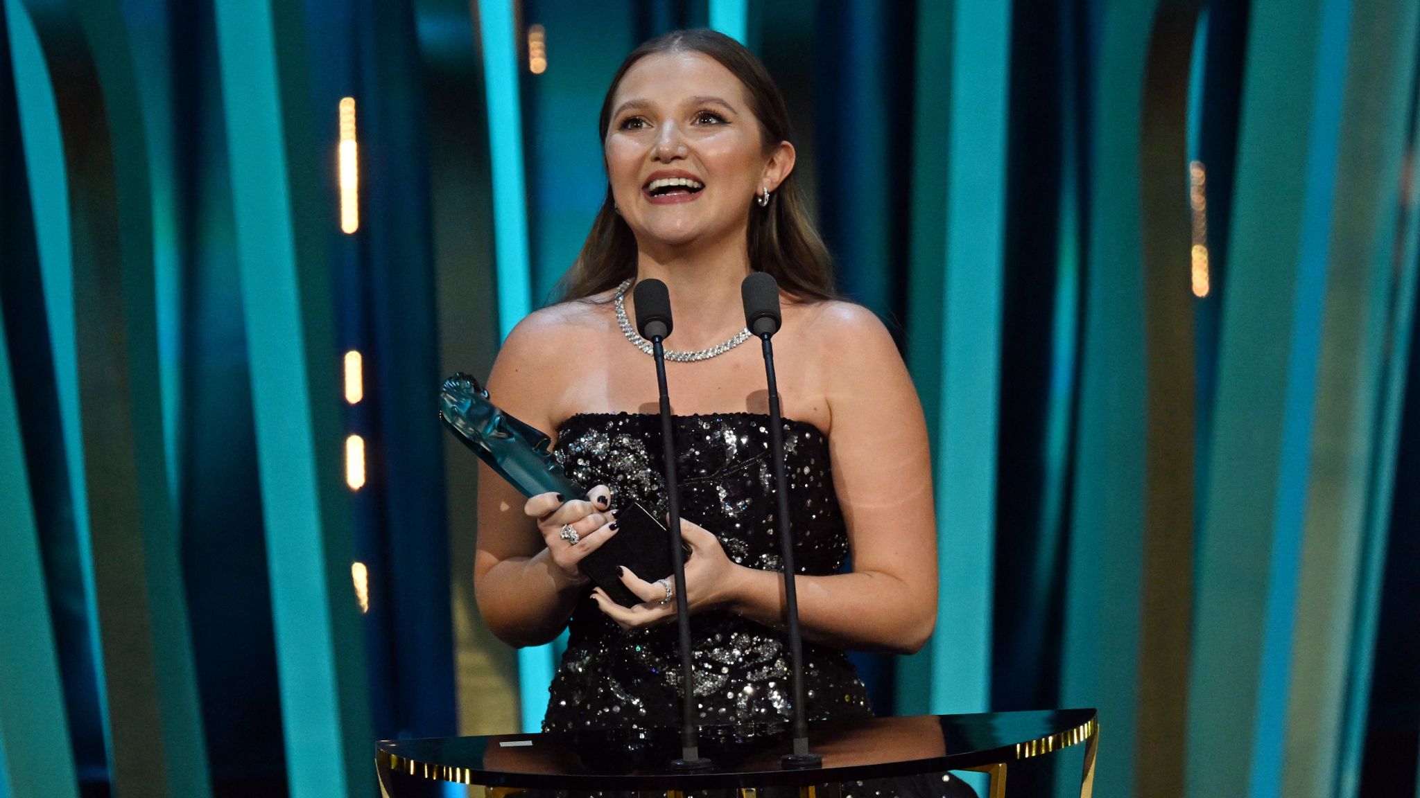 Mia McKenna-Bruce accepts the EE Rising Star Award during the 2024 EE BAFTA Film Awards, held at the Royal Festival Hall on February 18, 2024 in London, England. (Photo by Kate Green/BAFTA/Getty Images for BAFTA) 