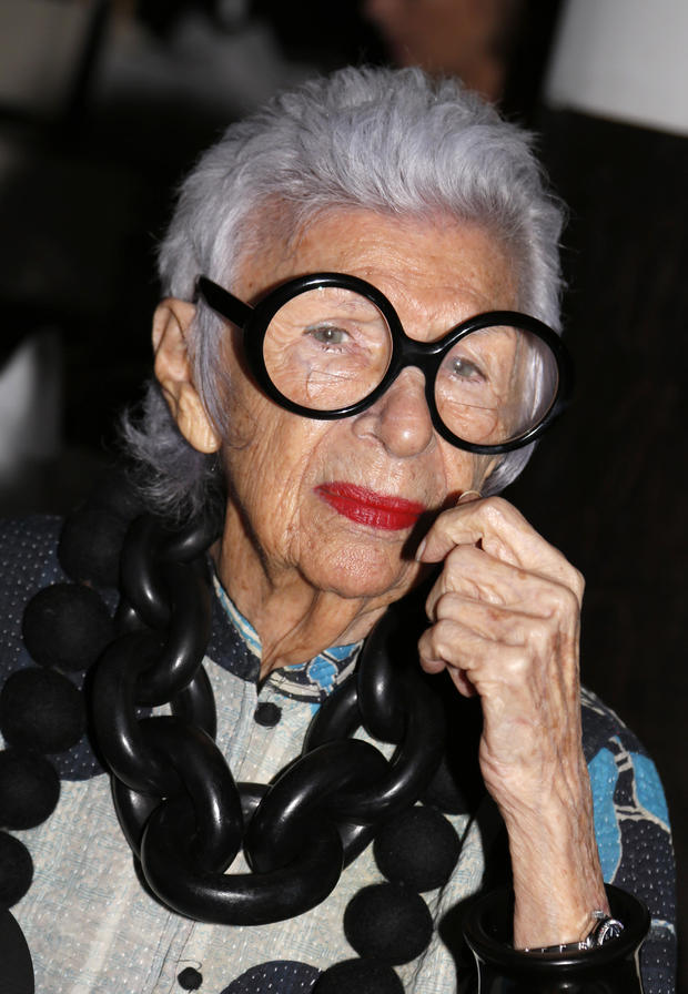 Iris Apfel takes her seat before the Serena Williams Signature Statement Spring 2017 collection is modeled during Fashion Week in New York, Monday, Sept. 12, 2016. 