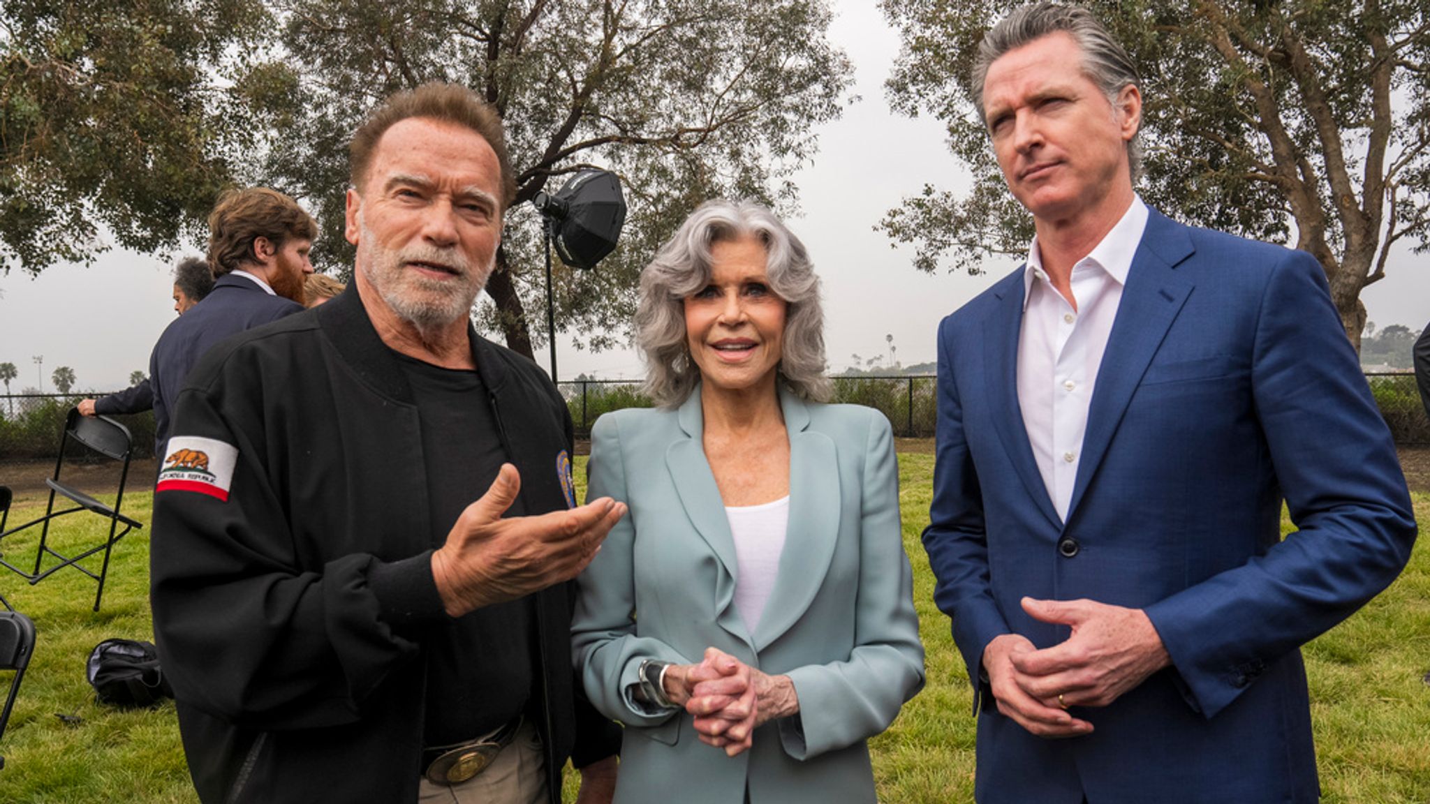 (L-R): Schwarzenegger, Jane Fonda, actor and ex-California Governor Gavin Newsom. Pic: AP