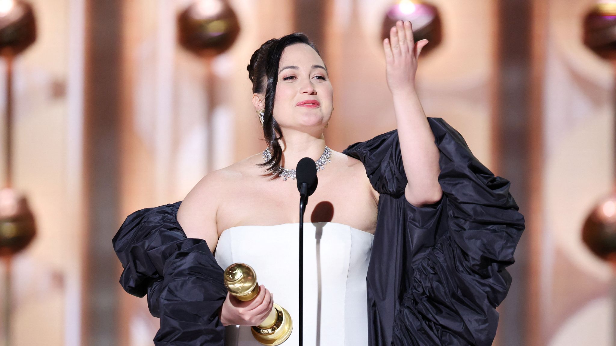 Lily Gladstone e accepts the award for Best Performance by a Female Actor in a Motion Picture at the Golden Globes. Pic: Reuters