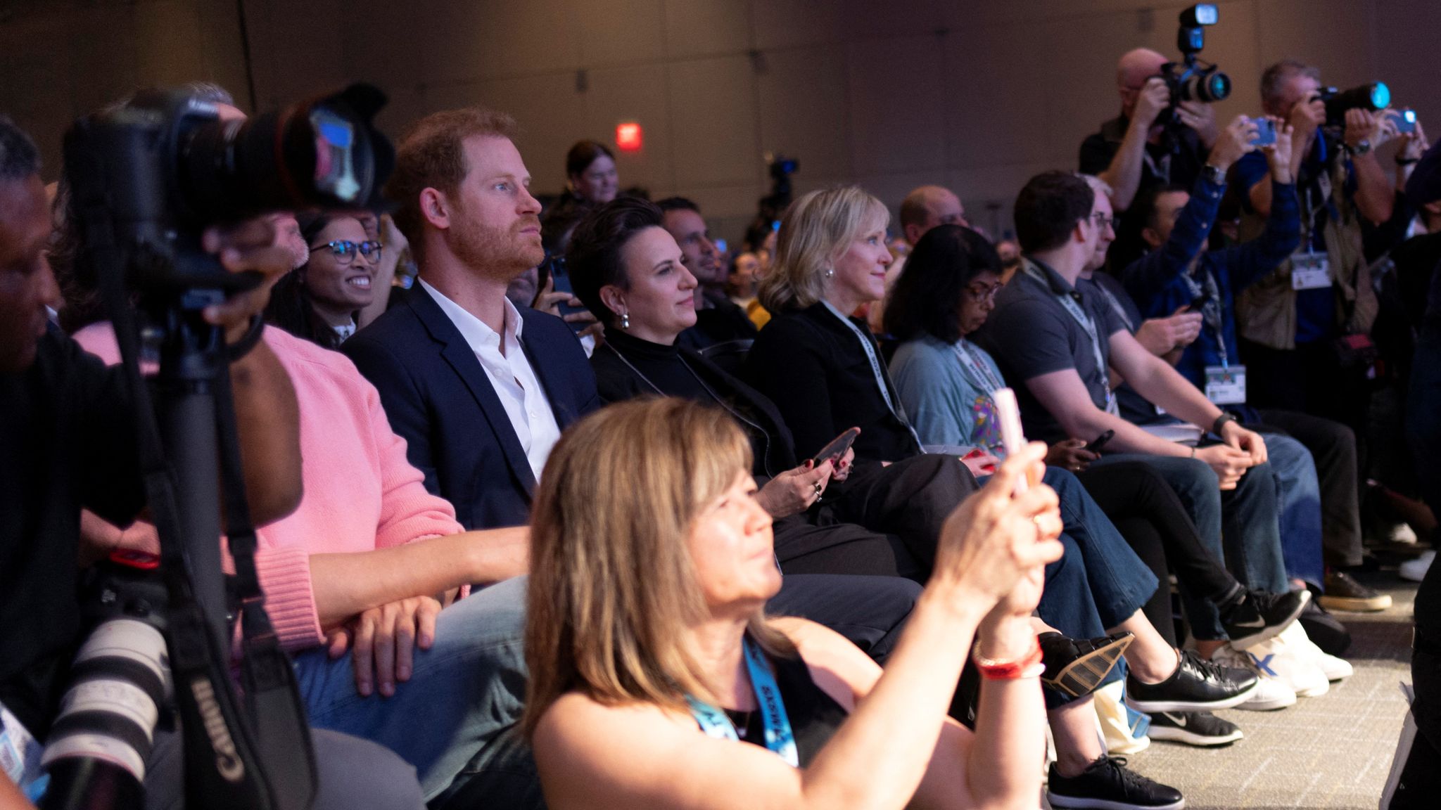 Prince Harry waits for his wife, Meghan, Duchess of Sussex, to take the stage during a keynote on women’s representation in media and entertainment in Austin, Texas, on International Women&#39;s Day 2024. Pic: Reuters