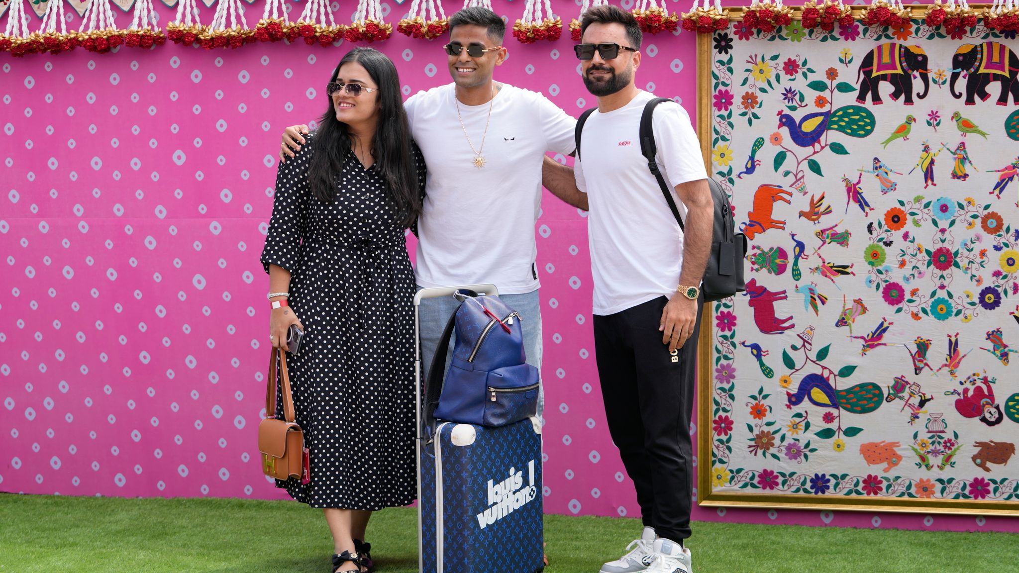 Surya Kumar Yadav , his wife Devisha and fellow cricketer Rashid Khan. Pic: AP Photo/Ajit Solanki