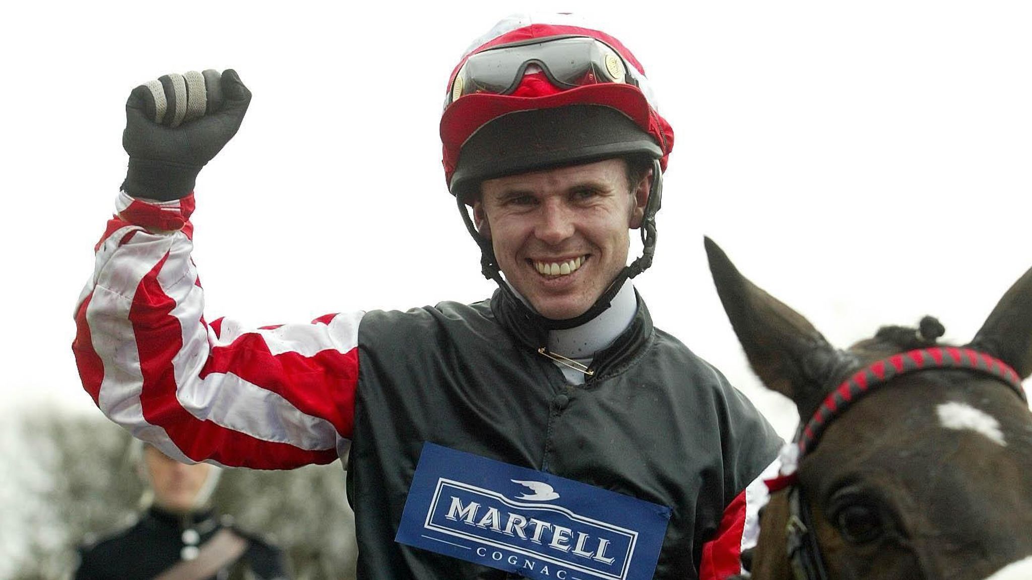 Graham Lee celebrates winning the 2004 Grand National on Amberleigh House