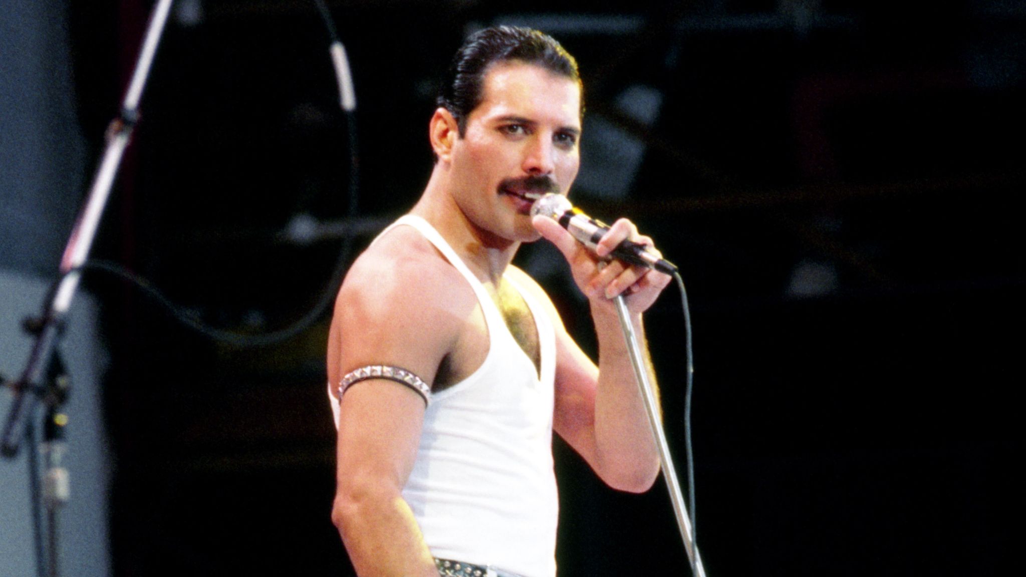 Freddie Mercury on stage during Queen's Live Aid set