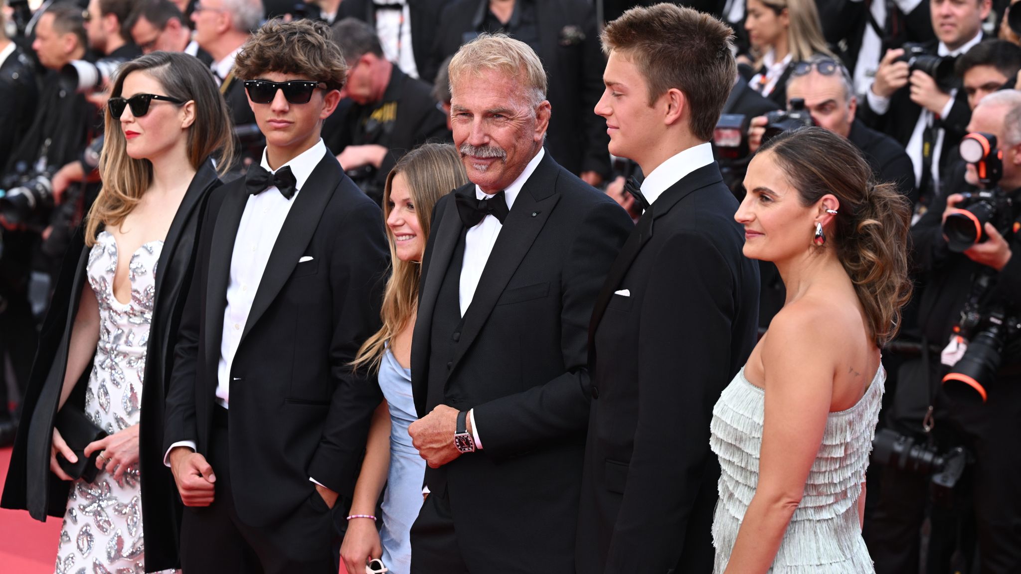 The Costner family: (L-R) Lily, Hayes Logan, Grace Avery, Kevin, Cayden Wyatt and Annie. Pic: PA