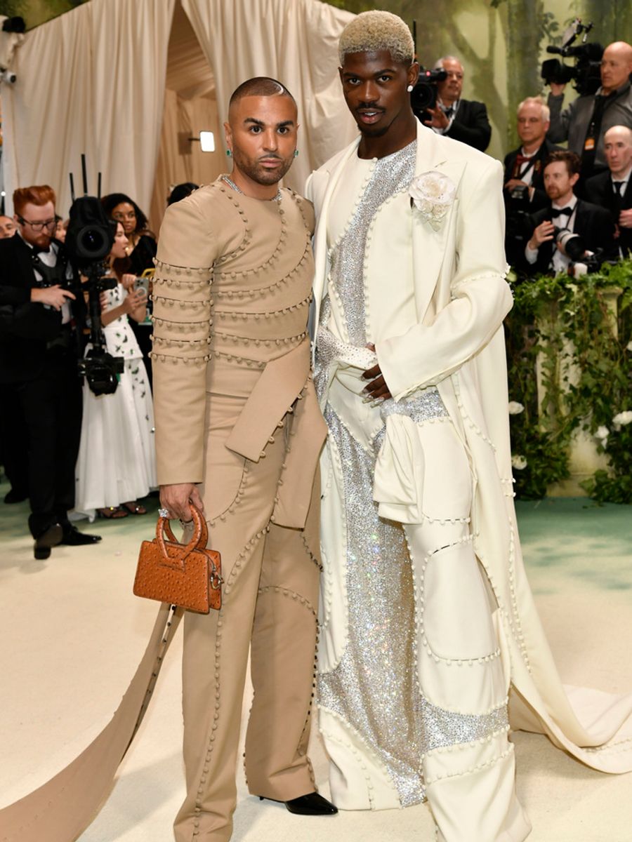 Raul Lopez, left, and Lil Nas X attend The Metropolitan Museum of Art&#39;s Costume Institute benefit gala celebrating the opening of the "Sleeping Beauties: Reawakening Fashion" exhibition on Monday, May 6, 2024, in New York. (Photo by Evan Agostini/Invision/AP)