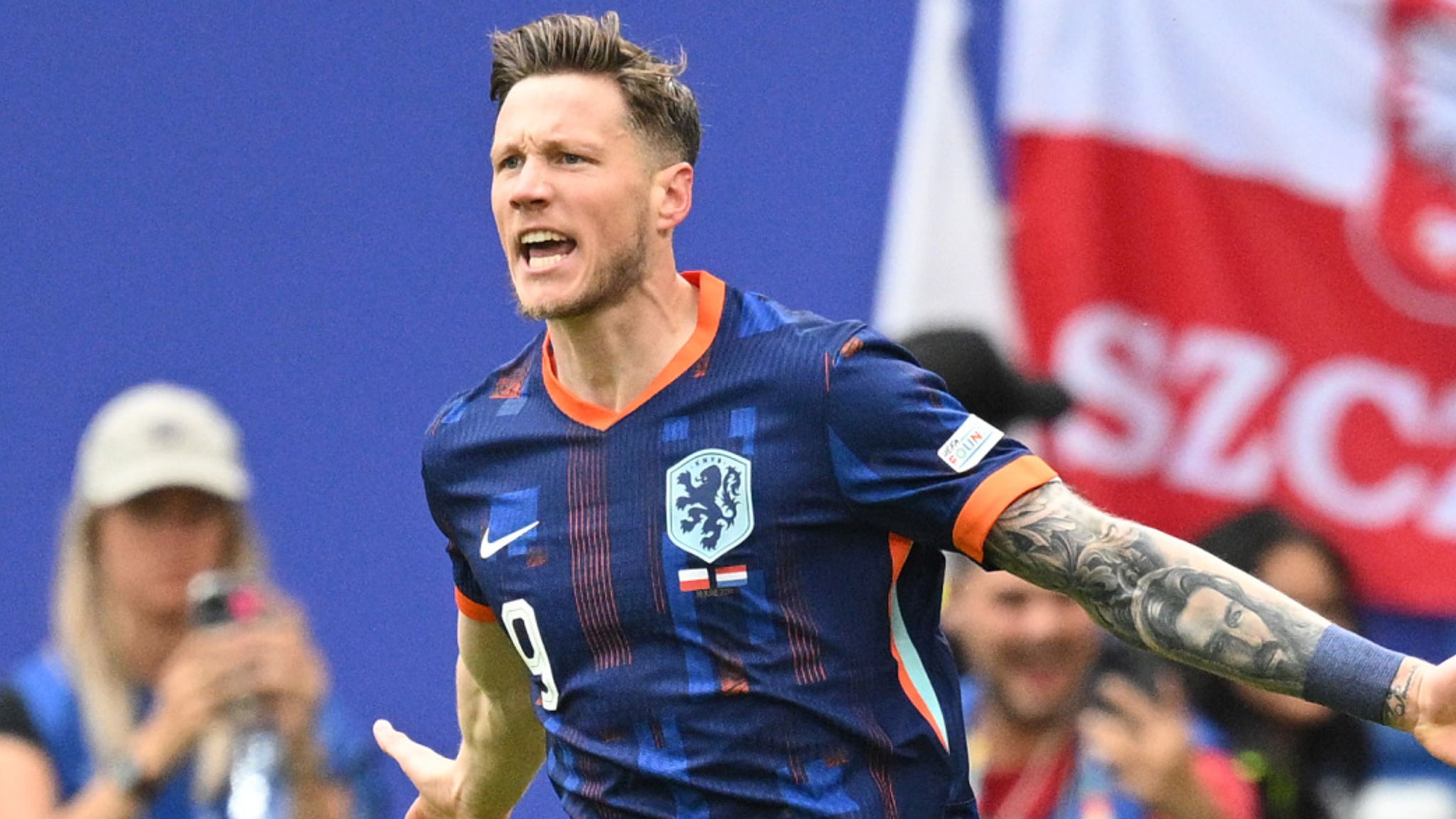 Wout Weghorst celebrates after giving the Netherlands a 2-1 lead against Poland