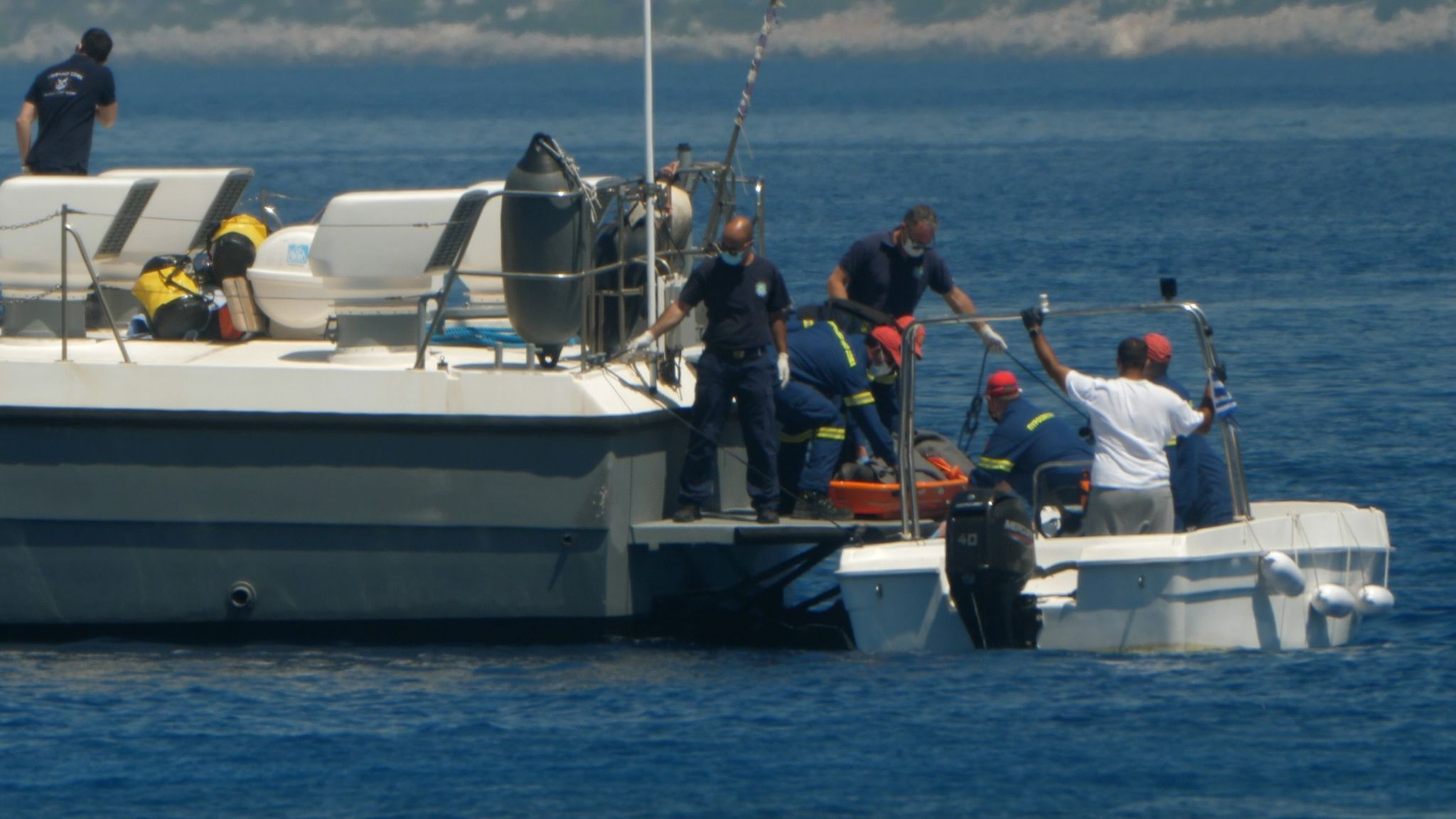 A coastguard boat took the body to Rhodes for a post-mortem 