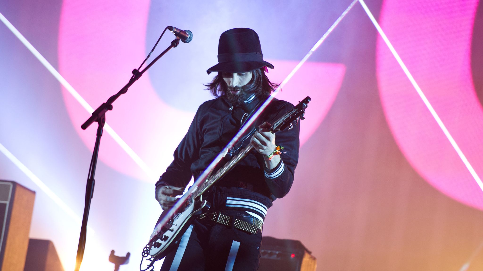 Kasabian frontman Serge Pizzorno on stage headlining Glastonbury in 2014. Pic: James Mccauley/Shutterstock