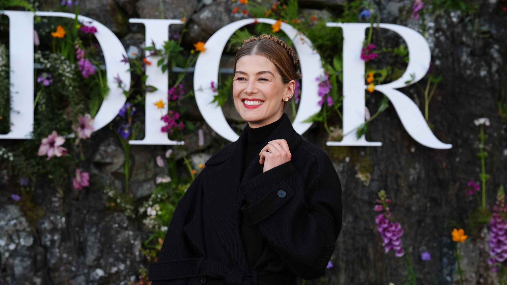 Rosamund Pike attends the Dior Cruise 2025 show at Drummond Castle, Perthshire. Picture date: Monday June 3, 2024.