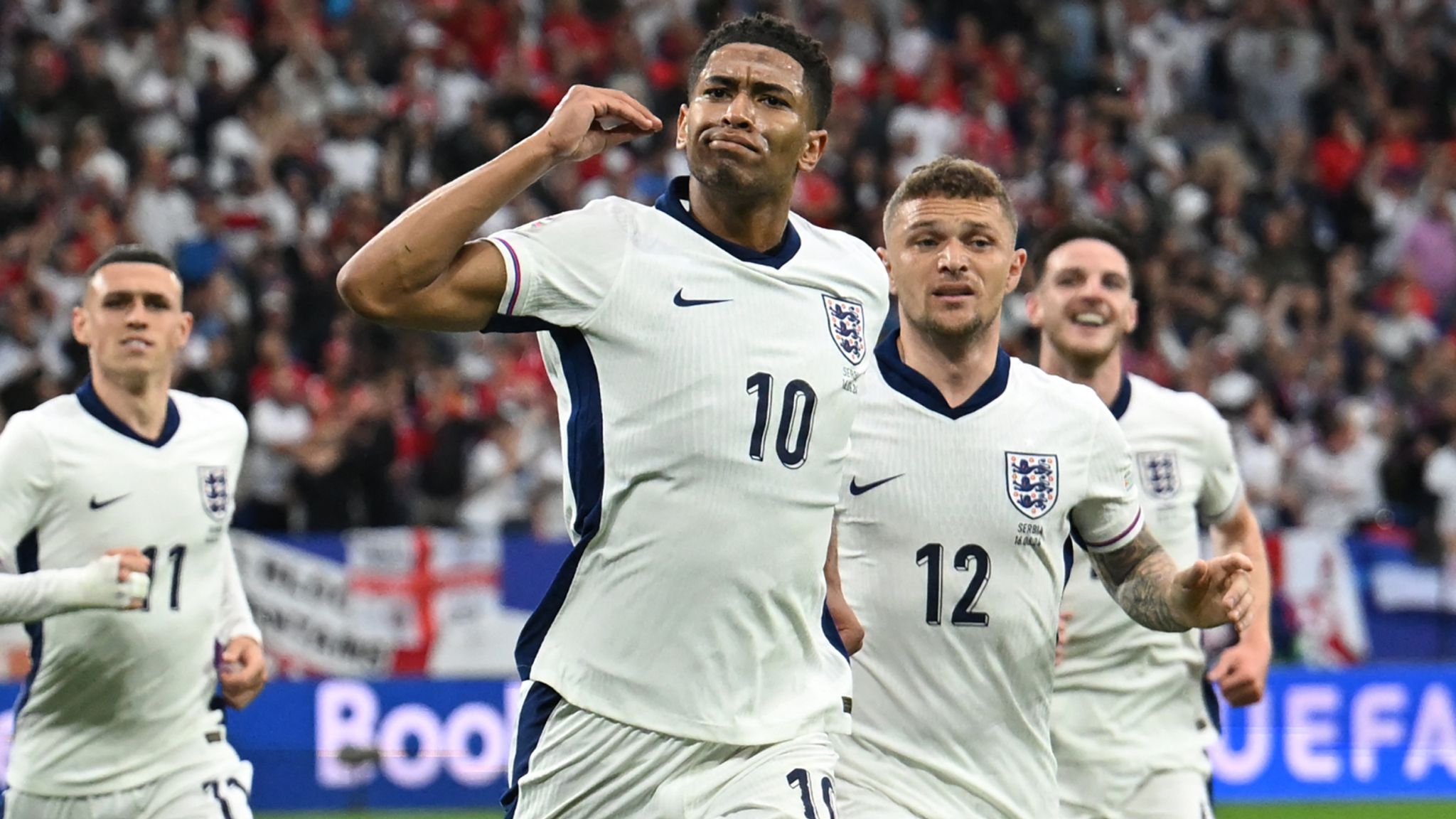 Jude Bellingham celebrates after heading England in front against Serbia