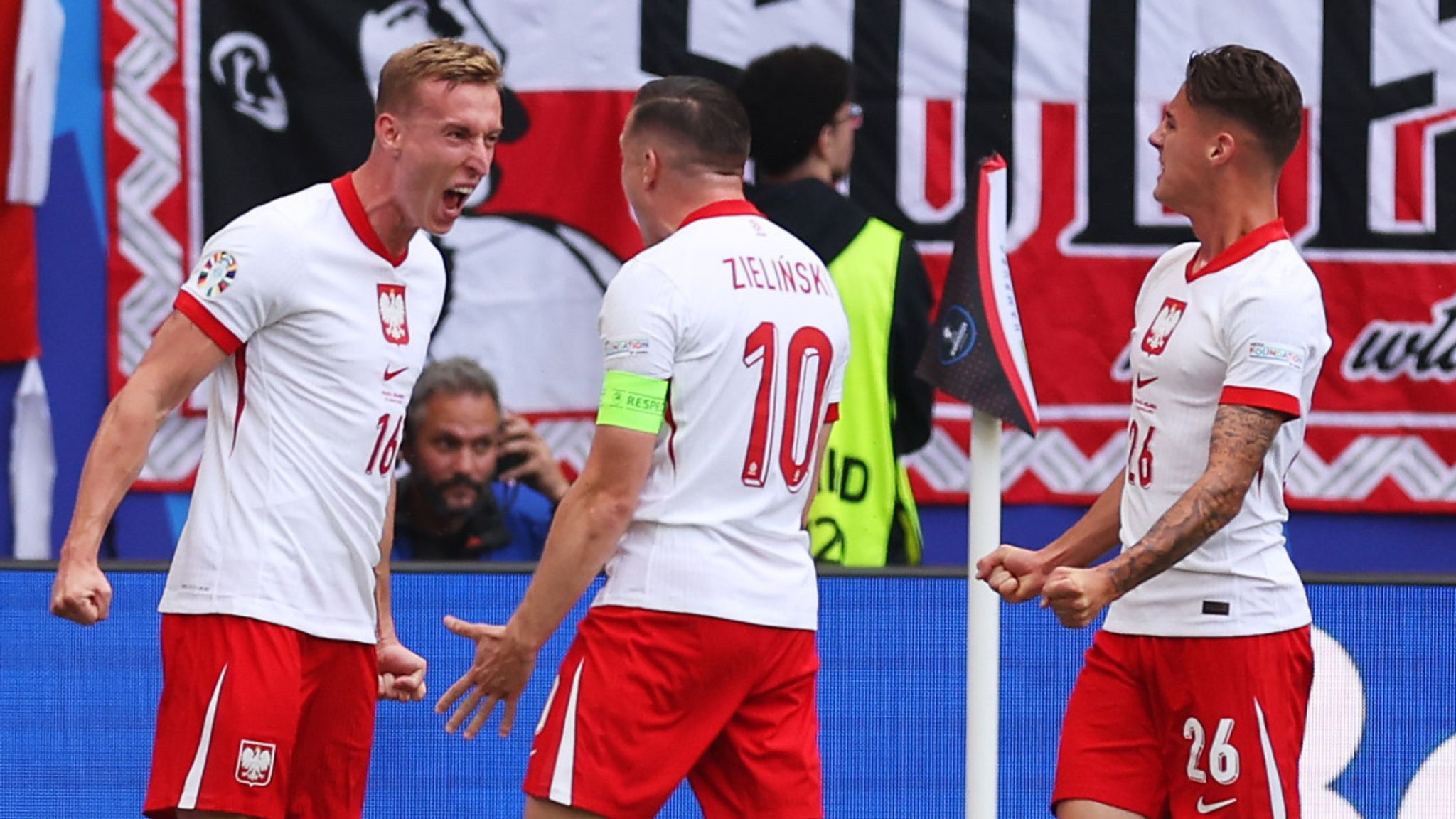 Adam Buska celebrates after heading Poland in front against the Netherlands