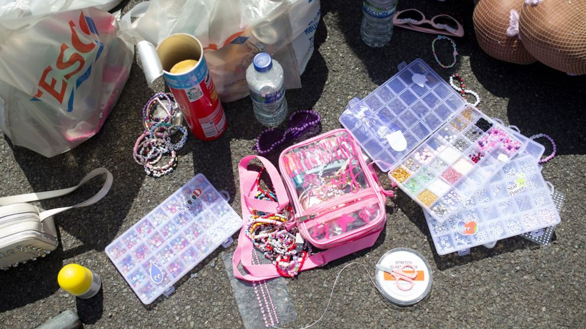 Charlotte Coney/PA Wire Fans wait outside Wembley Stadium in London, ahead of Taylor Swift's first London concert, during her Eras Tour. Picture date: Friday June 21, 2024.