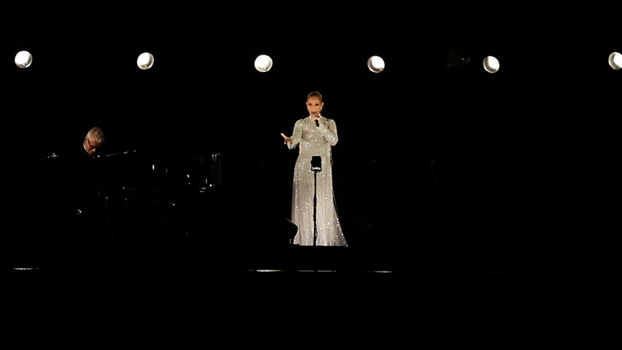 Celine Dion performed on the Eiffel Tower. Pic: Reuters