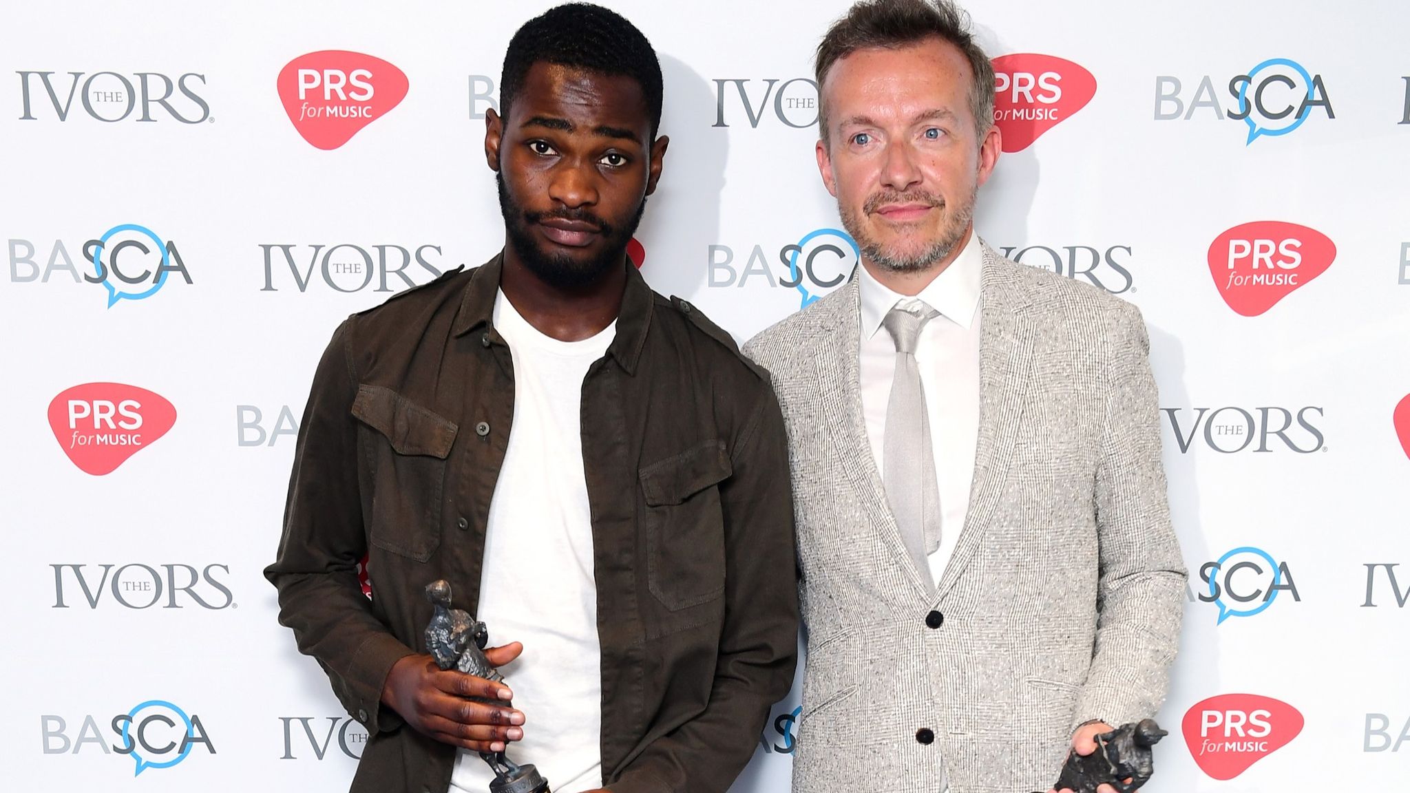 Dave and Fraser T Smith with the award for best contemporary song at the 63rd annual Ivor Novello Songwriting Awards in London in 2018. Pic: Ian West/PA