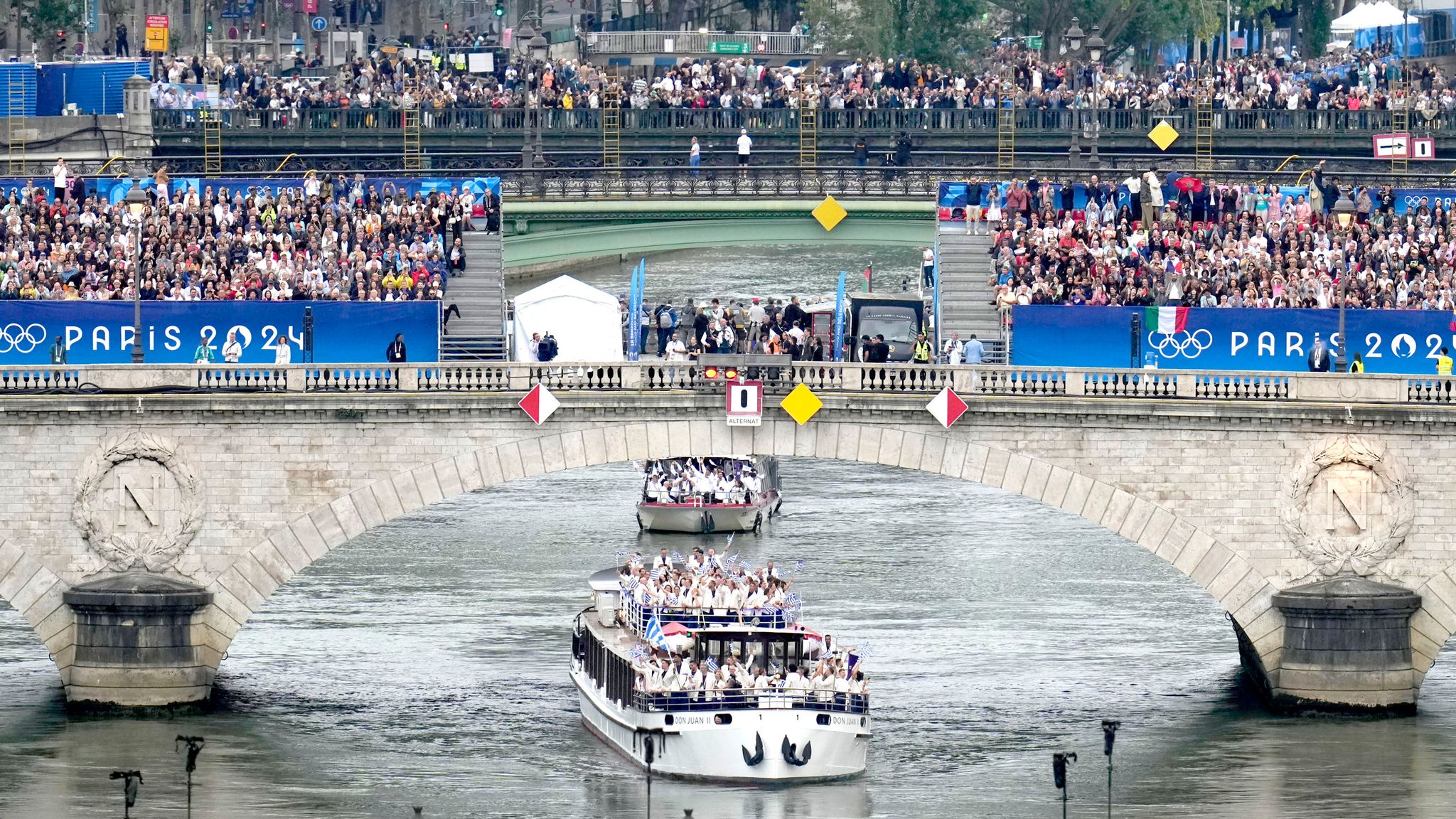 Team Greece travels by boat along the Seine river in Paris, France, during the opening ceremony of the 2024 Summer Olympics, Friday, July 26, 2024. (AP Photo/Ricardo Mazalan)