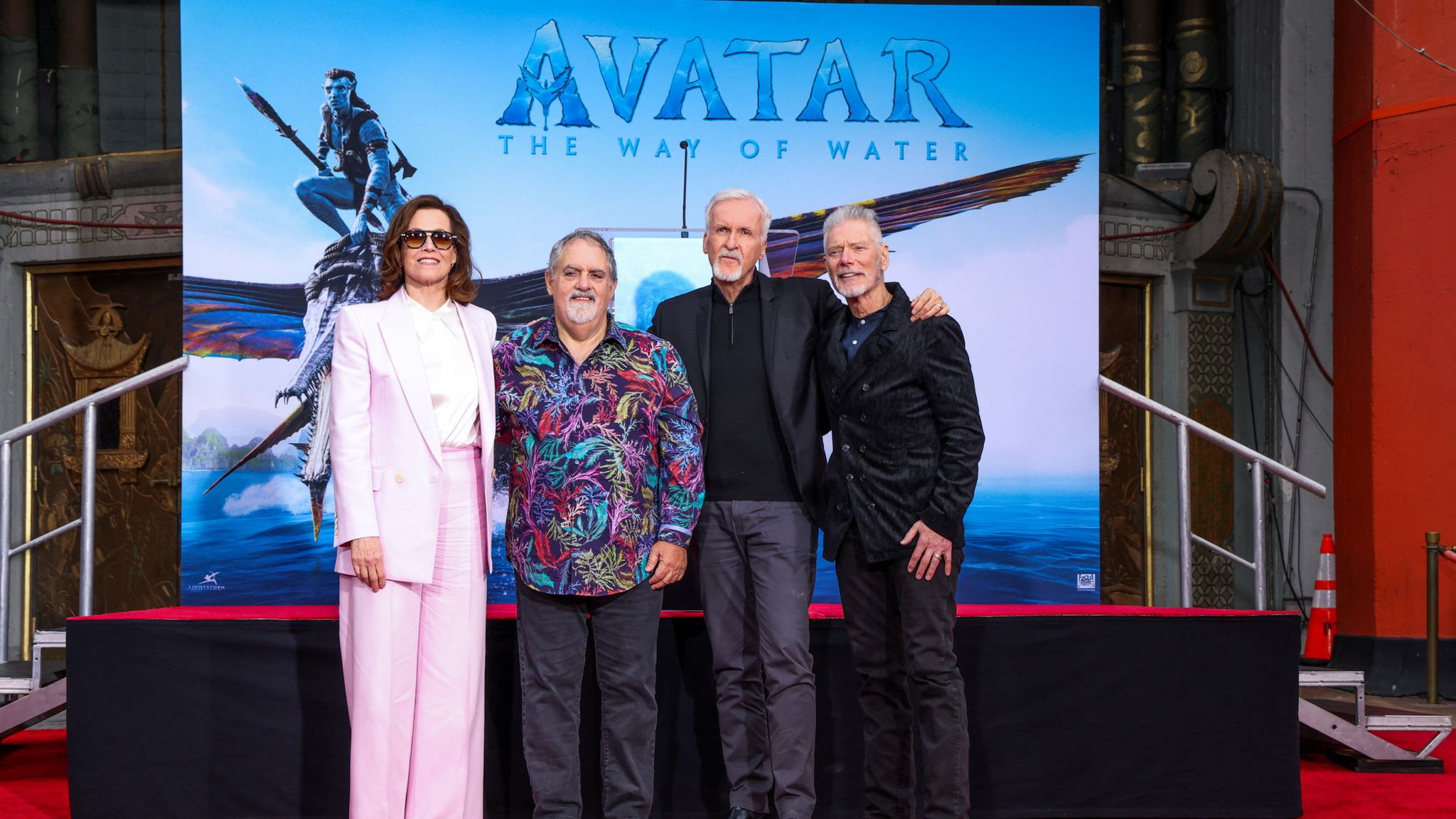 Director James Cameron and Producer Jon Landau pose along with Sigourney Weaver and Stephen Lang during an event where they placed their handprints and footprints in cement at the forecourt of the TCL Chinese Theatre in Los Angeles, California, U.S., January 12, 2023. REUTERS/Mario Anzuoni