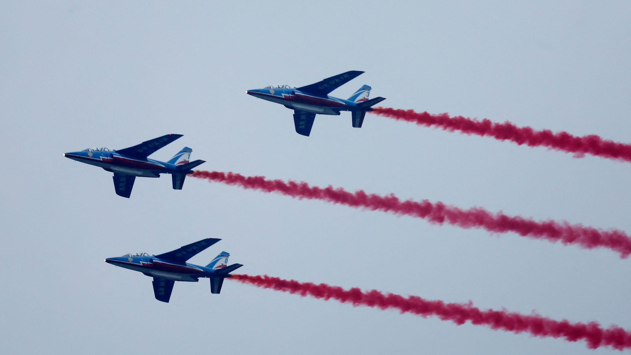 Aircraft of the Patrouille de France are seen flying over Paris during the opening ceremony. Pic Reuters