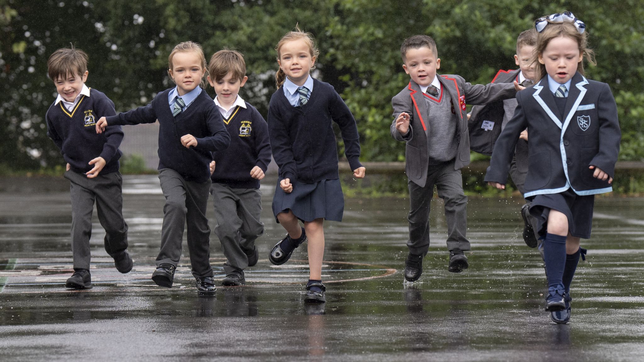 Some of the sets of twins that are due to start the new school term in the Inverclyde area pose for photographs at St Patrick's Primary School in Greenock, Inverclyde, ahead of the first day at their respective schools. Picture date: Tuesday August 13, 2024.